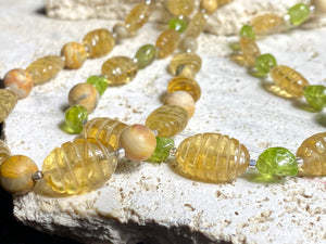 Stunning natural bead necklaces made up of graduated, etched golden citrine, peridot & jasper beads, highlighted with handmade sterling silver beads and clasp.