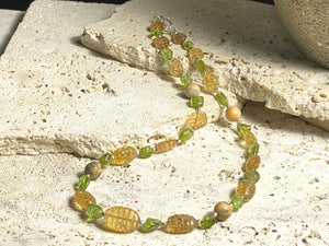 Stunning natural bead necklaces made up of graduated, etched golden citrine, peridot & jasper beads, highlighted with handmade sterling silver beads and clasp.