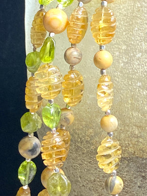 Stunning natural bead necklaces made up of graduated, etched golden citrine, peridot & jasper beads, highlighted with handmade sterling silver beads and clasp.