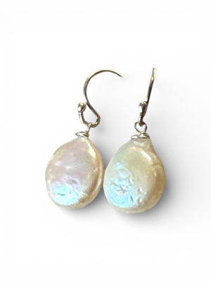 Simple cultured coin pearl earrings finished with sterling silver hooks. Pearl diameter 1.2 mm, earring length 2.8 cm