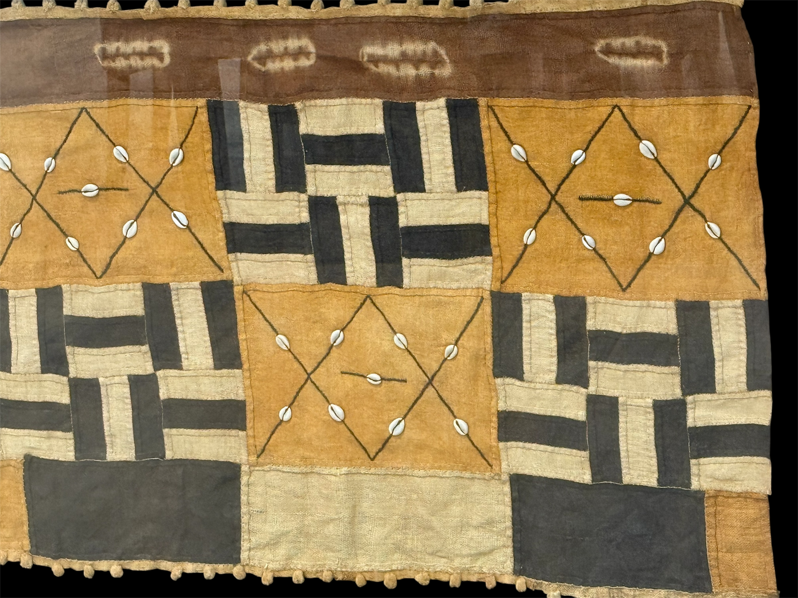 Vintage Kuba textile. Democratic Republic of the Congo. Mid 20th C. Professionally mounted in wood box frame. Textile: 122 x 66 cm, Box: 140 x 87 x 6 cm