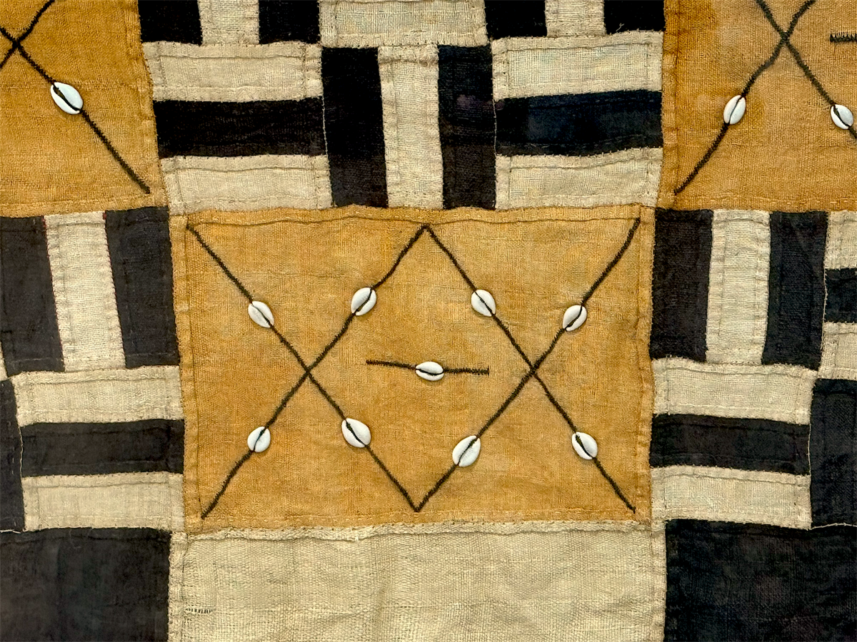 Vintage Kuba textile. Democratic Republic of the Congo. Mid 20th C. Professionally mounted in wood box frame. Textile: 122 x 66 cm, Box: 140 x 87 x 6 cm