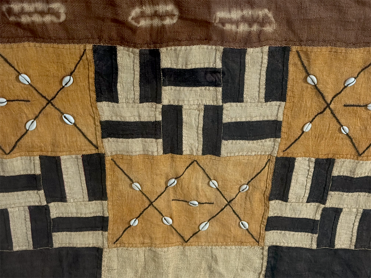 Vintage Kuba textile. Democratic Republic of the Congo. Mid 20th C. Professionally mounted in wood box frame. Textile: 122 x 66 cm, Box: 140 x 87 x 6 cm