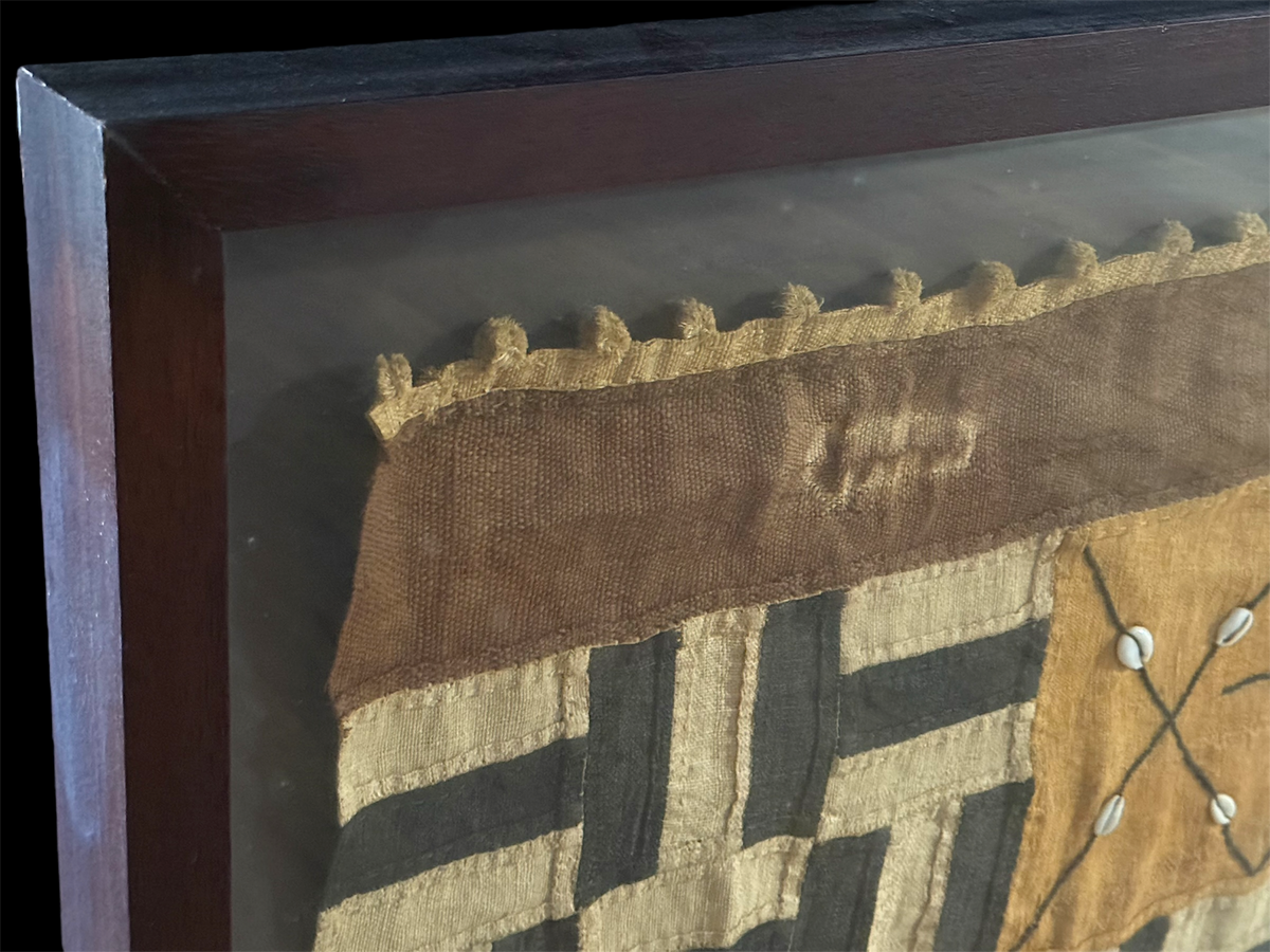 Vintage Kuba textile. Democratic Republic of the Congo. Mid 20th C. Professionally mounted in wood box frame. Textile: 122 x 66 cm, Box: 140 x 87 x 6 cm