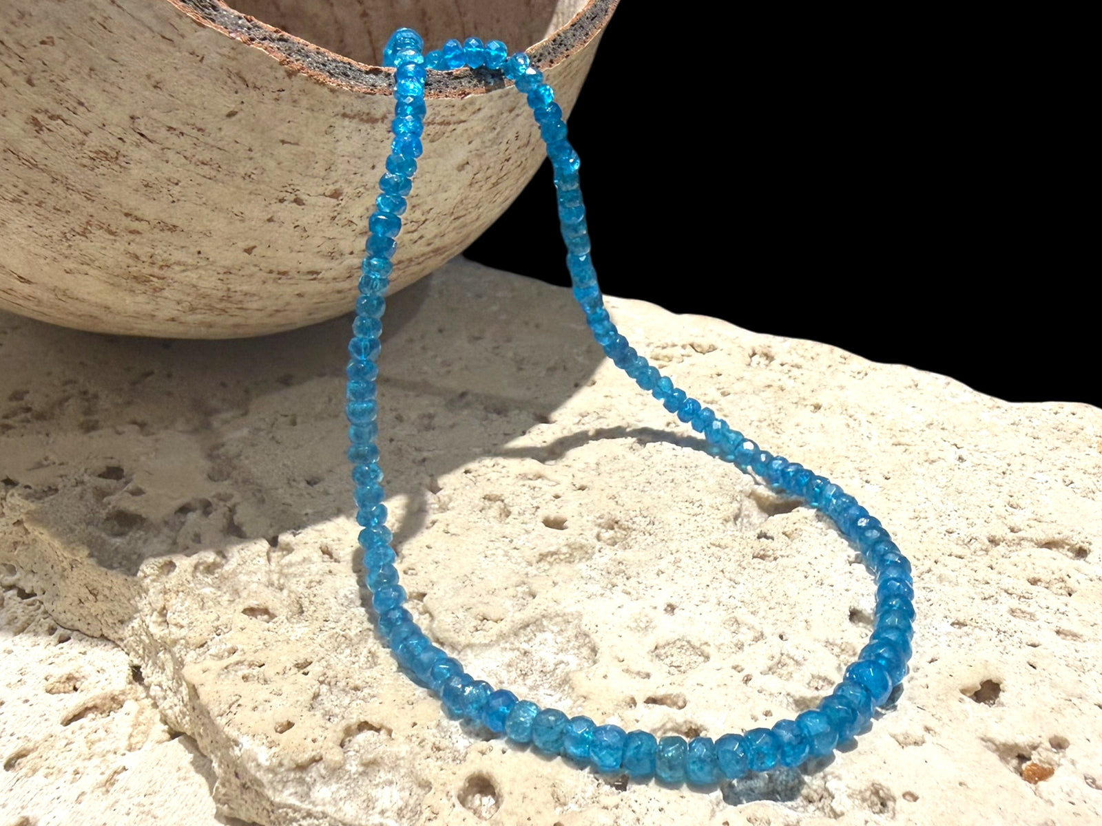 Dark blue apatite necklace featuring graduated and faceted natural apatite beads finished with a sterling silver lobster clasp. Length 39.7 cm 