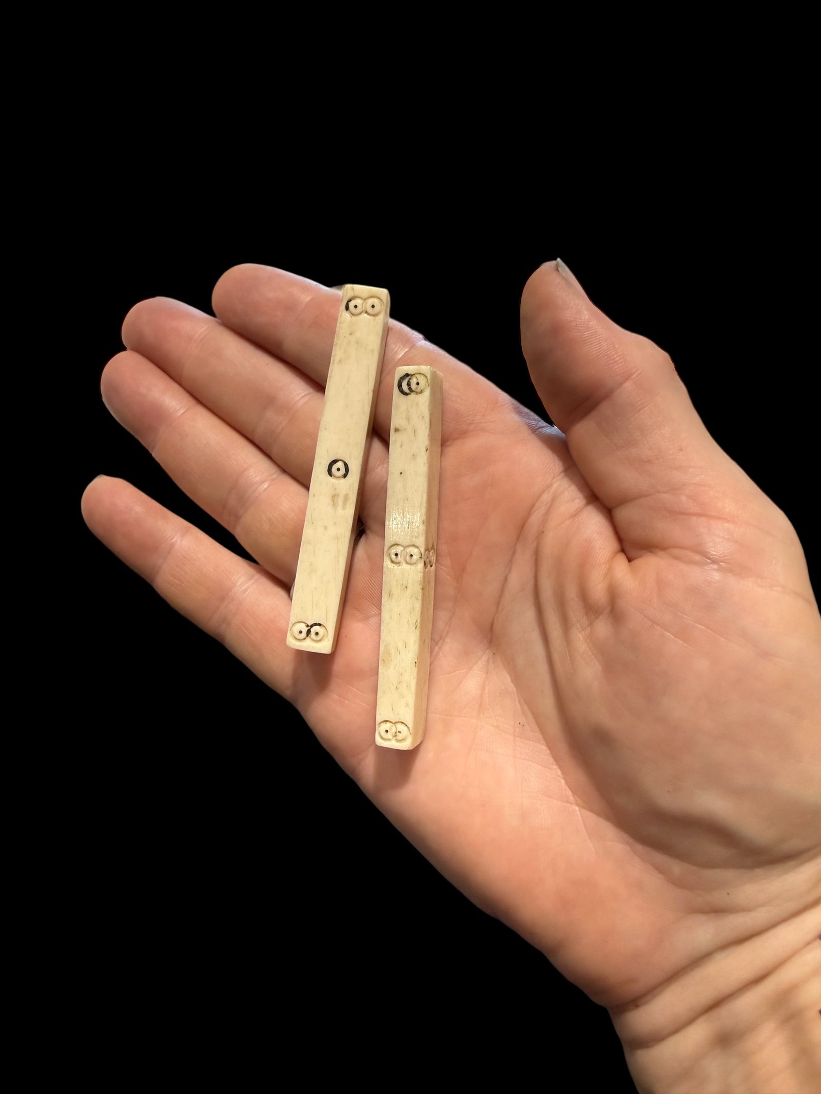 Pair of vintage stick Mah Jong dice, hand carved from deer antler. Northern Vietnam. Measurements: length approximately 7 cm, 6 mm x 8 mm