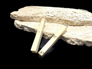 Pair of vintage stick Mah Jong dice, hand carved from deer antler. Northern Vietnam. Measurements: length approximately 7 cm, 6 mm x 8 mm