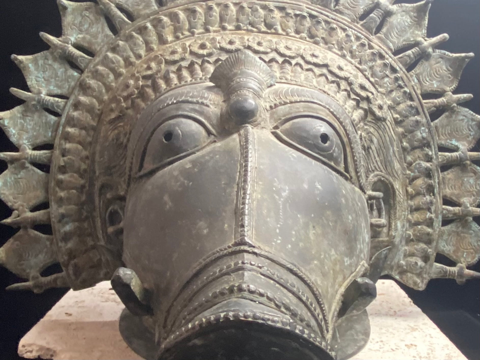 Ceremonial dancer's headpiece worn as a mask in the form of Vishnu's incarnation as Varaha. For ritual use in annual Dharmanema dance festivals. Early 20th century. Bronze lost wax casting. From Kerala, southern India. Measurements: Width 51 cm, height 43 cm, depth 32 cm.