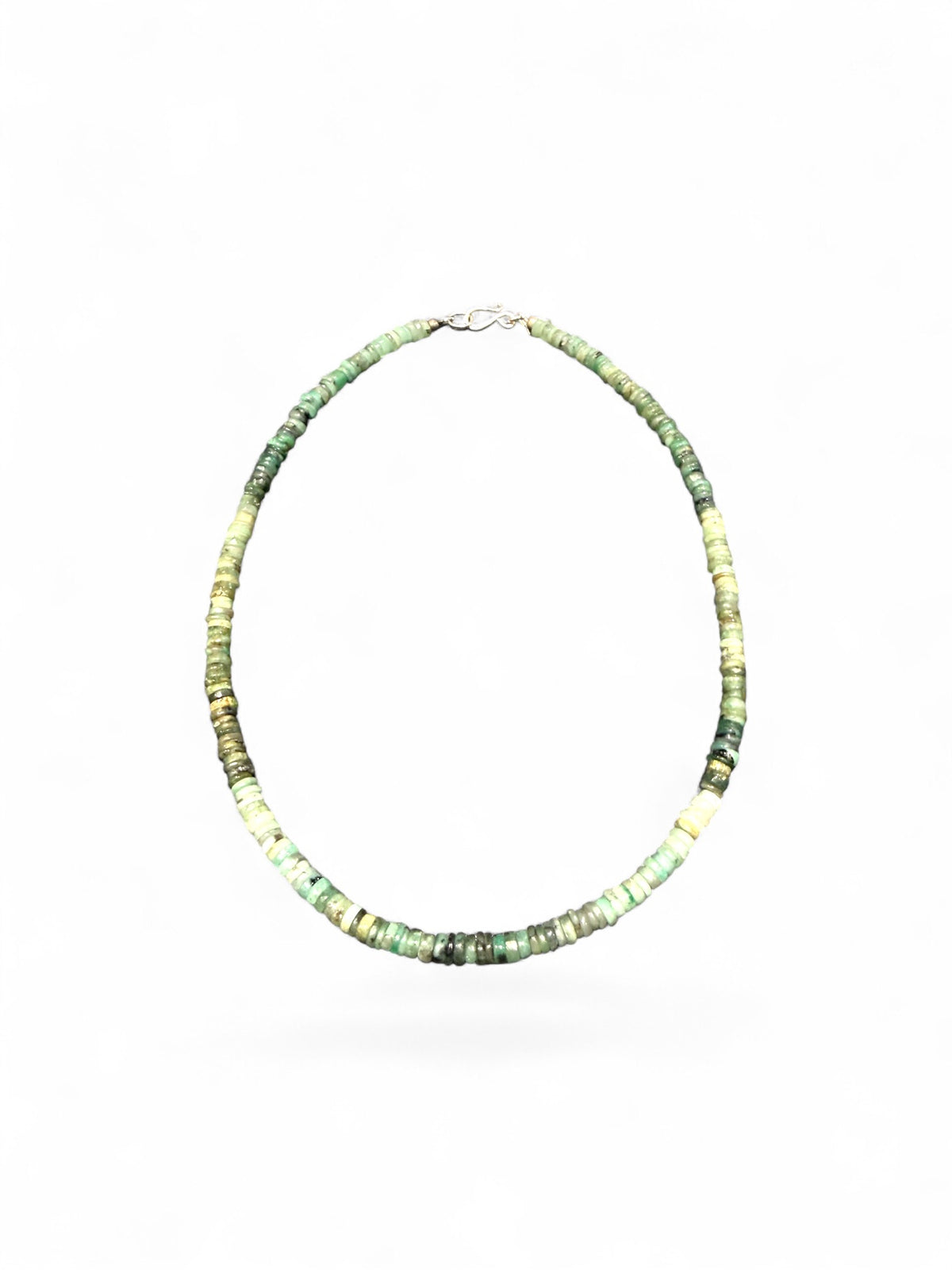 Heshi cut natural emerald necklace features sterling silver findings and a hook clasp. Length 43.5 cm.