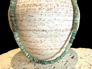Heshi cut natural emerald necklace features sterling silver findings and a hook clasp. Length 43.5 cm.