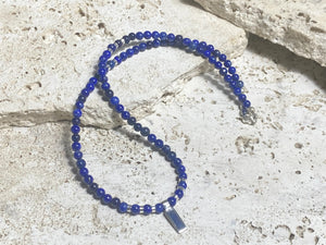 Simple & stylish short necklace of Afghan lapis with a silver and lapis pendant, highlighted with silver beads and a sterling silver parrot clasp. Length 41 cm