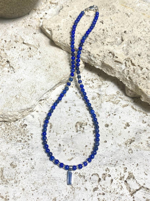 Simple & stylish short necklace of Afghan lapis with a silver and lapis pendant, highlighted with silver beads and a sterling silver parrot clasp. Length 41 cm