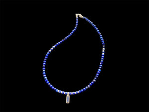 Simple & stylish short necklace of Afghan lapis with a silver and lapis pendant, highlighted with silver beads and a sterling silver parrot clasp. Length 41 cm