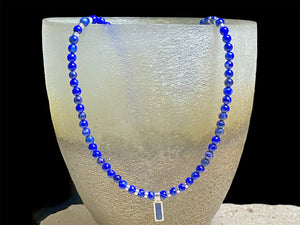 Simple & stylish short necklace of Afghan lapis with a silver and lapis pendant, highlighted with silver beads and a sterling silver parrot clasp. Length 41 cm