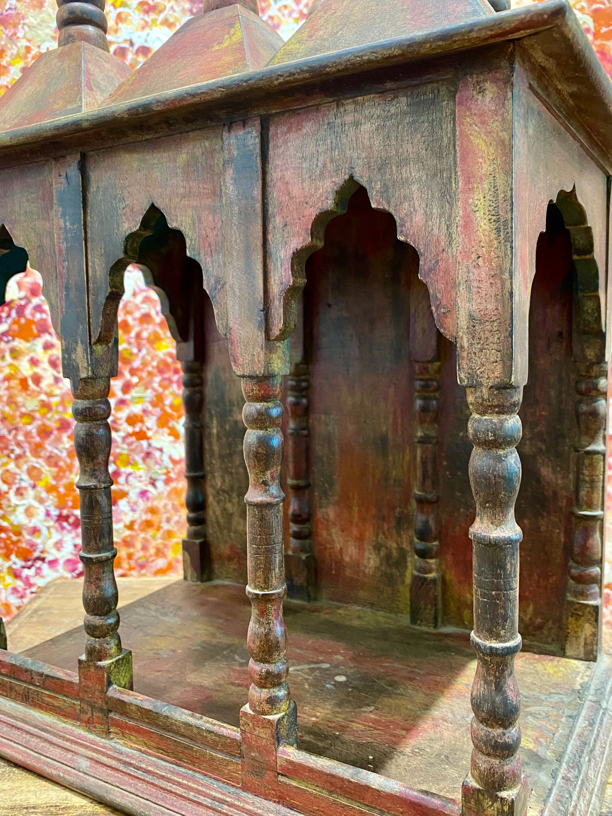 Solid timber shrine, nicho or display box, with three sections or bays,  beautifully carved and finished on three sides and inside with carved pillars, solid wood back, stepped up footing and peaked roof with finial. Most likely teak. Dates from the 1950-60s, southern India. Height 47.5 cm, depth 25 cm, width 38 cm