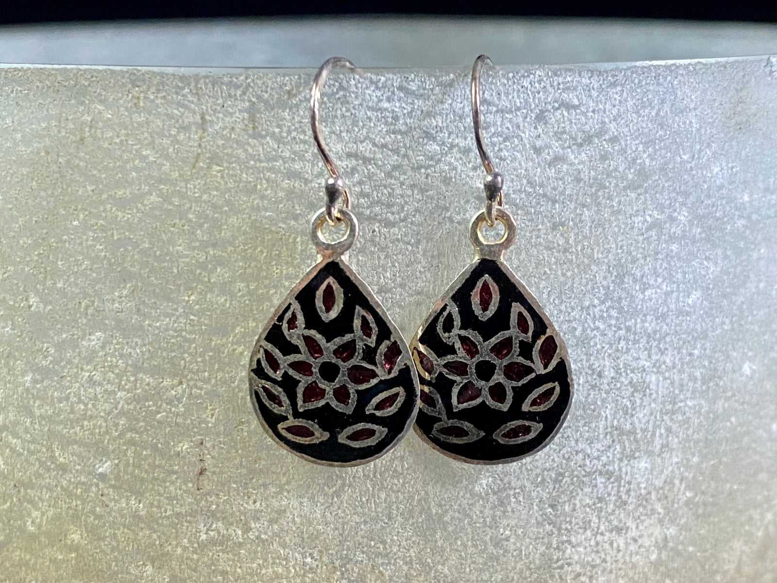 Beautiful hand crafted enamel and sterling silver dangle earrings from Jaipur, India. Lightweight and easy to wear, with sterling silver hooks. Plain silver backs. 3 cm drop including hook, the enamelled panel is 2 cm in length