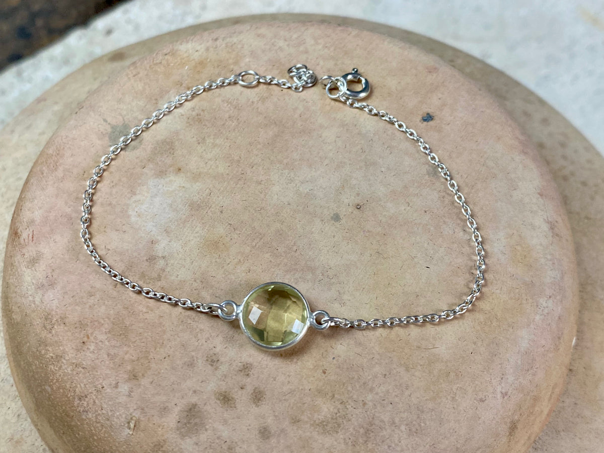 Elegant bracelets set with single stones in a sterling silver chain and clasp. Note that these bracelets are adjustable in length to suit your wrist size  Measurements: 17.2 - 19.8 cm length