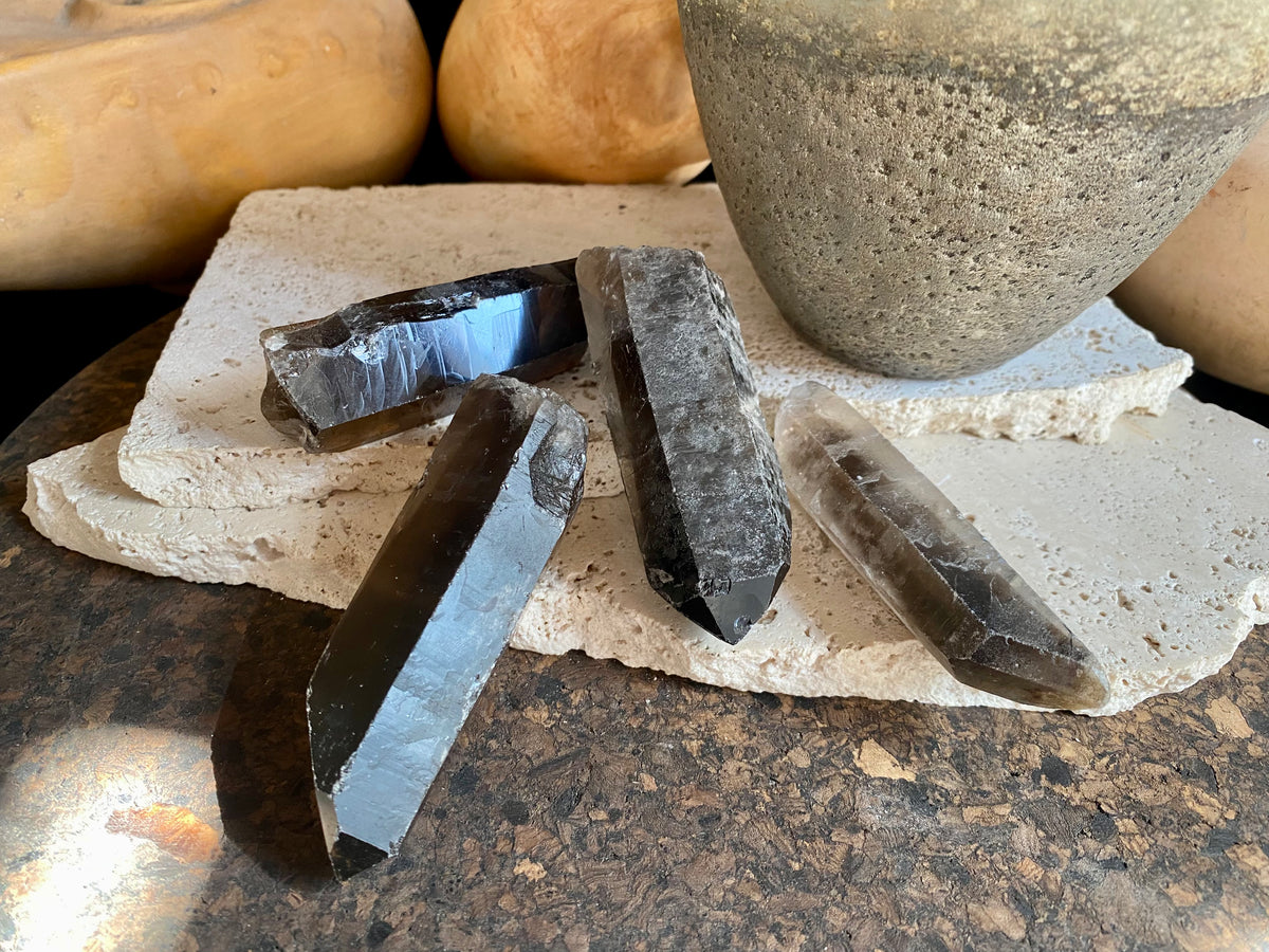 Natural smokey quartz crystal points.  Measurements: our crystals are approximately 8 cm in  length