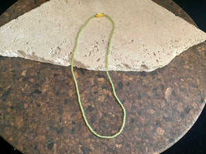 Natural green peridot bead necklace. Brass screw clasp. Length 37 cm