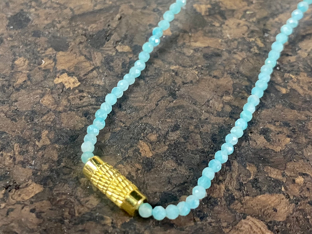 Natural clear blue amazonite facet cut fine bead choker. Brass screw clasp. Length 39.5 cm