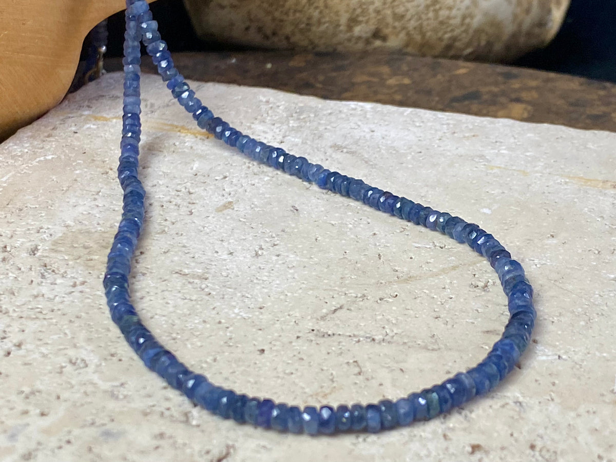 Beaded sapphire necklace made up of finely graduated, matched facet-cut African blue sapphires. The necklace is finished with a sterling silver lobster clasp. This is a unisex necklace - perfect for men or women. Length 45.5 cm (17.85")