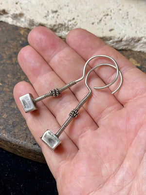 Rabari tribal earrings. High grade silver. Hollow construction, lightweight and easy to wear. Mid 20th century. Traditionally worn in both the ear lobe and in the upper cartilage of the ear. Length 5.8 cm