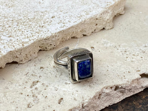 This beautiful vintage ring features a lapis lazuli stone. This ring sits high on the finger and is a definite statement piece. High grade silver. From Afghanistan, mid 20th century. Adjustable. Measurements: Ring face 1.6 x 1.3 cm, diameter 18.5 mm | Size 8.5 | No 19, to fit any finger from 7 - 9