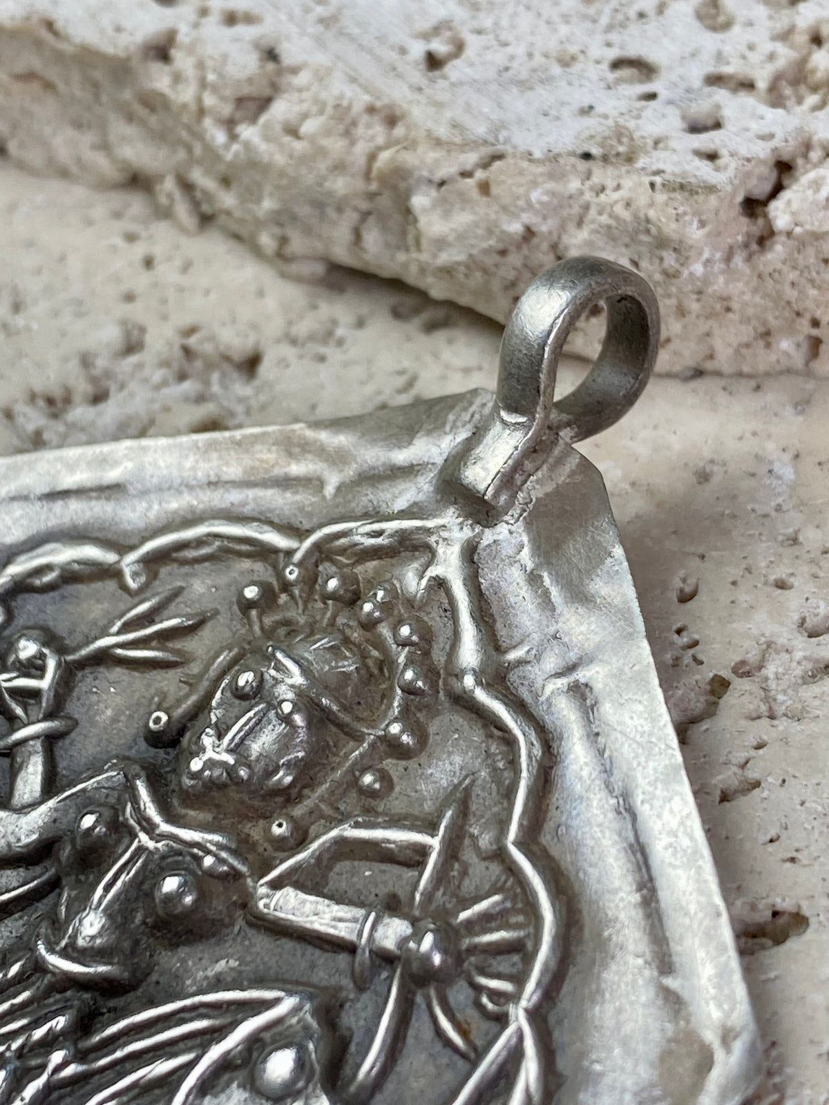 Very large Durga amulet - wear as a pendant or hang as an ornament. Early 20th century, the bail has been replaced at some stage as it most likely wore through..  Measurements: height 8.5 cm including bail, width 6.5 cm