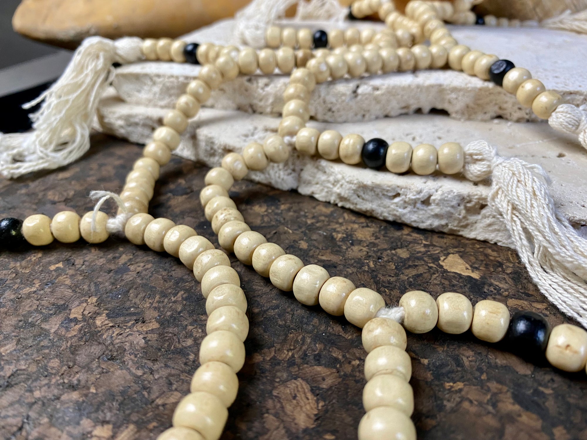 Women or men’s mala necklace. Made from lightweight wood, 108 beads and tasseled spacers. This is a light summer necklace that can be worn or simply hung as decoration. Total length 72 cm. Fits easily over the head. Wood beads 6 mm diameter