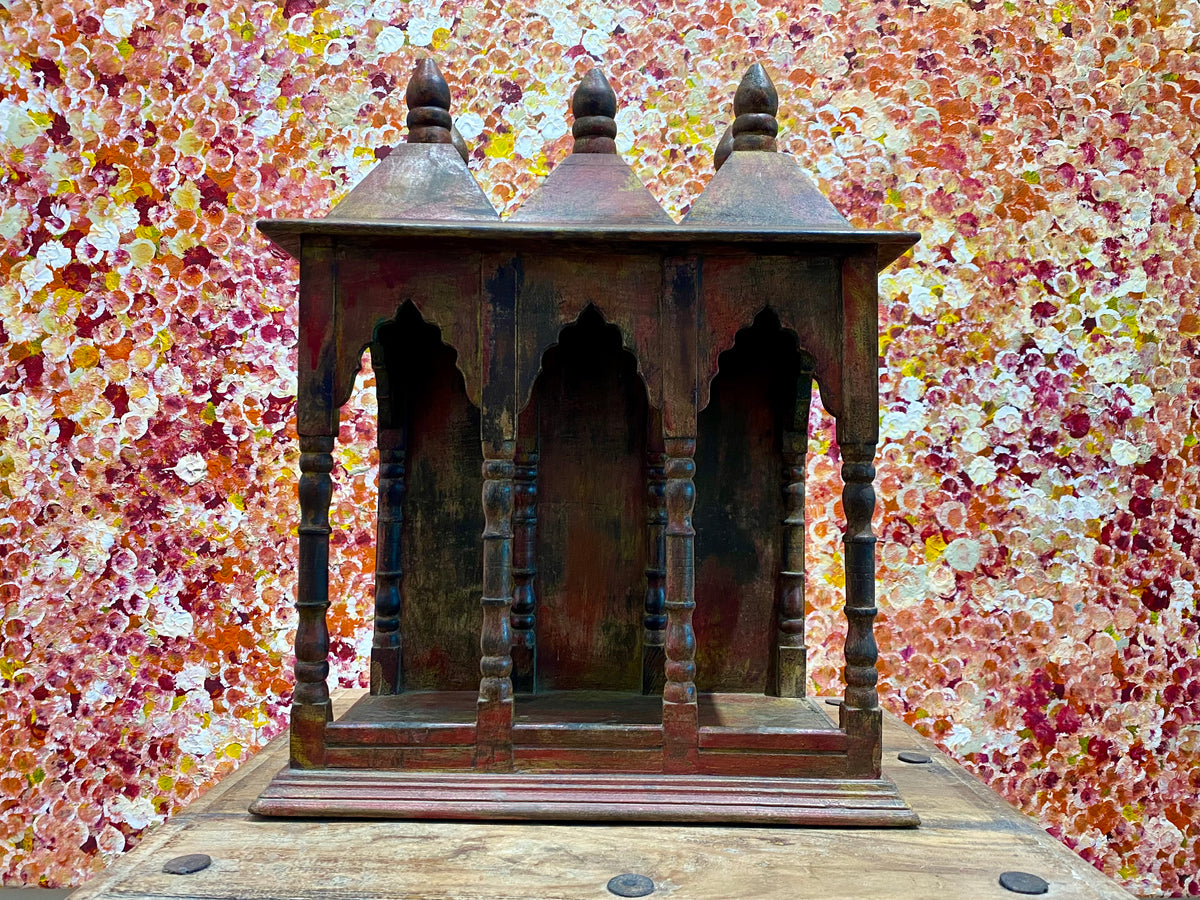 Solid timber shrine, nicho or display box, with three sections or bays,  beautifully carved and finished on three sides and inside with carved pillars, solid wood back, stepped up footing and peaked roof with finial. Most likely teak. Dates from the 1950-60s, southern India. Height 47.5 cm, depth 25 cm, width 38 cm