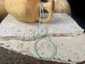Natural clear blue amazonite facet cut fine bead choker. Brass screw clasp. Length 39.5 cm