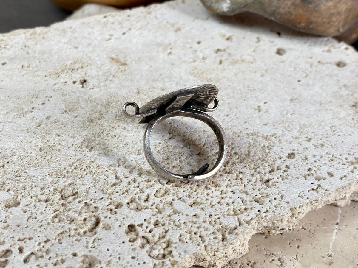 Statement tribal silver ring from regional Rajasthan, India. High grade or sterling silver. Adjustable back so it will fit a number of different finger sizes. Measurements: Ring face: 3.4 x 2.6 cm Size: Anywhere from size 6 to size 8, this ring is adjustable