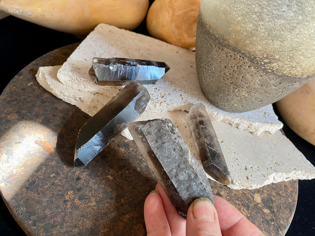 Natural smokey quartz crystal points.  Measurements: our crystals are approximately 8 cm in  length