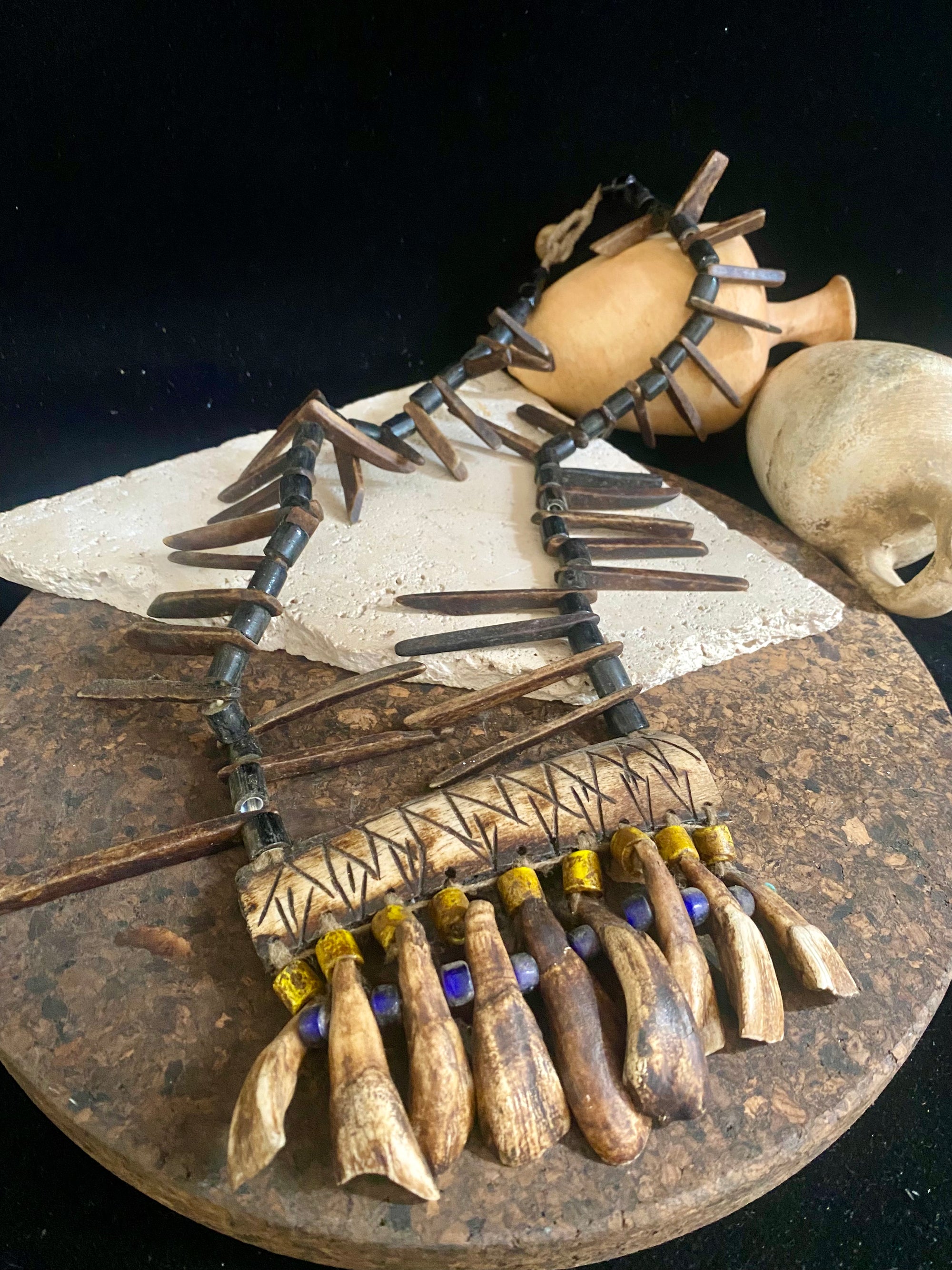 long buffalo tooth and bone necklace. It's made with a combination of buffalo bone, buffalo tooth and ceramic beads. This is a new necklace made in typical Naga tribal style. Length 45 cm