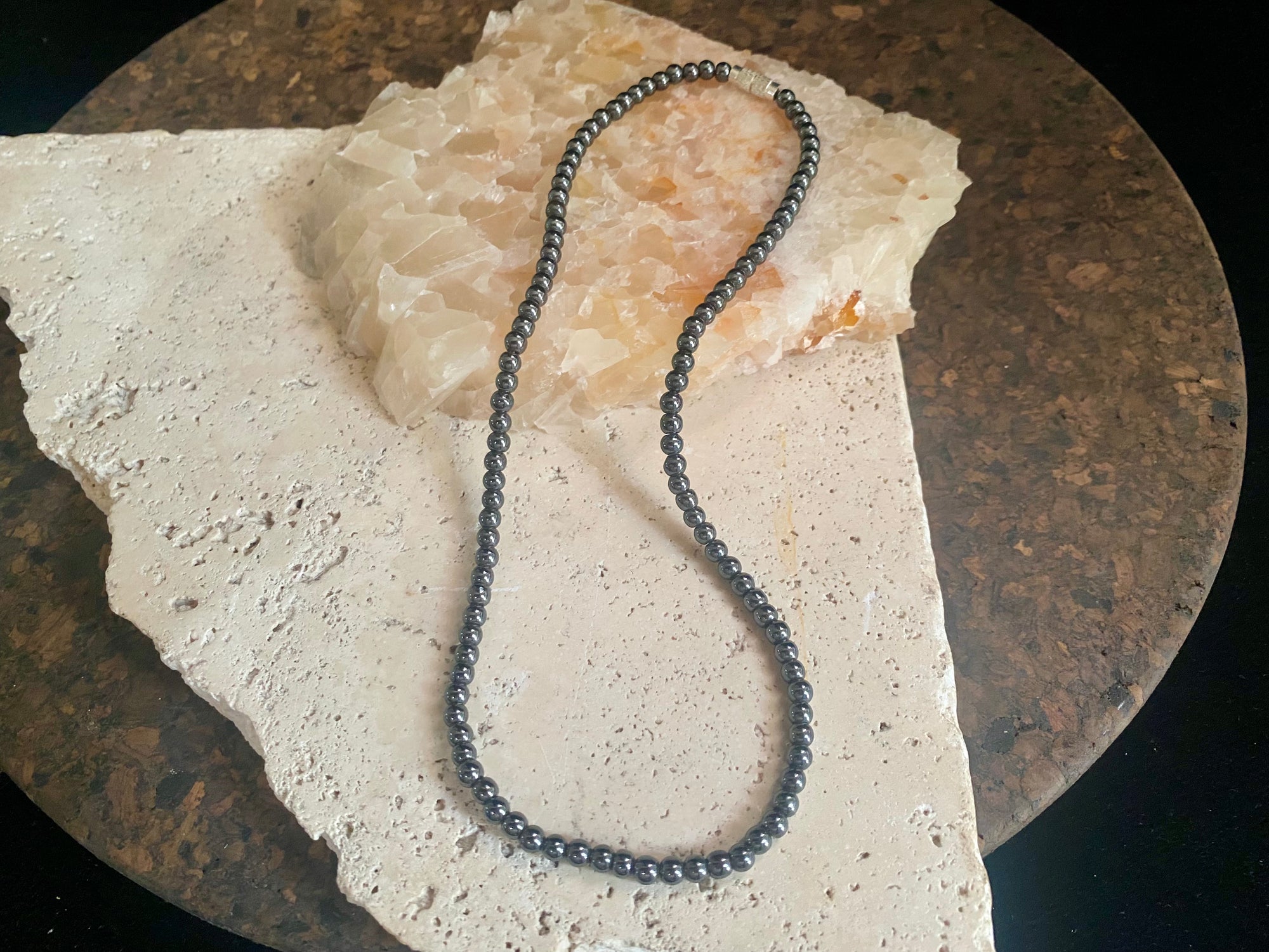 Natural haematite bead necklace. White metal screw clasp. Length 39 cm