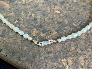 Elegant pearl and African jasper choker necklace, finished with sterling silver detailing and clasp. Length 40 cm
