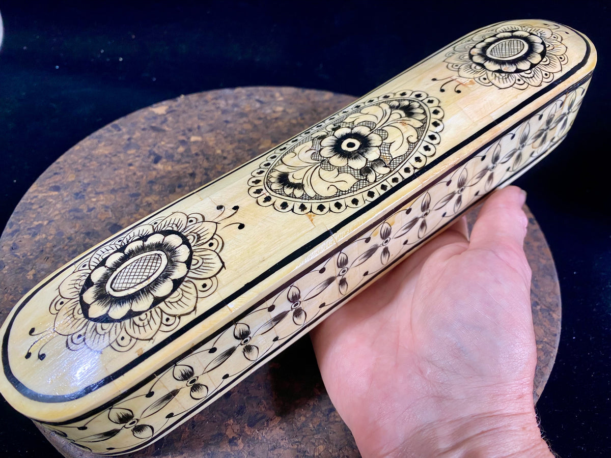traditional Indian pen boxes. Crafted from panels of camel bone over wood, fitted together then painted with detailed black scroll work. Length 28 cm