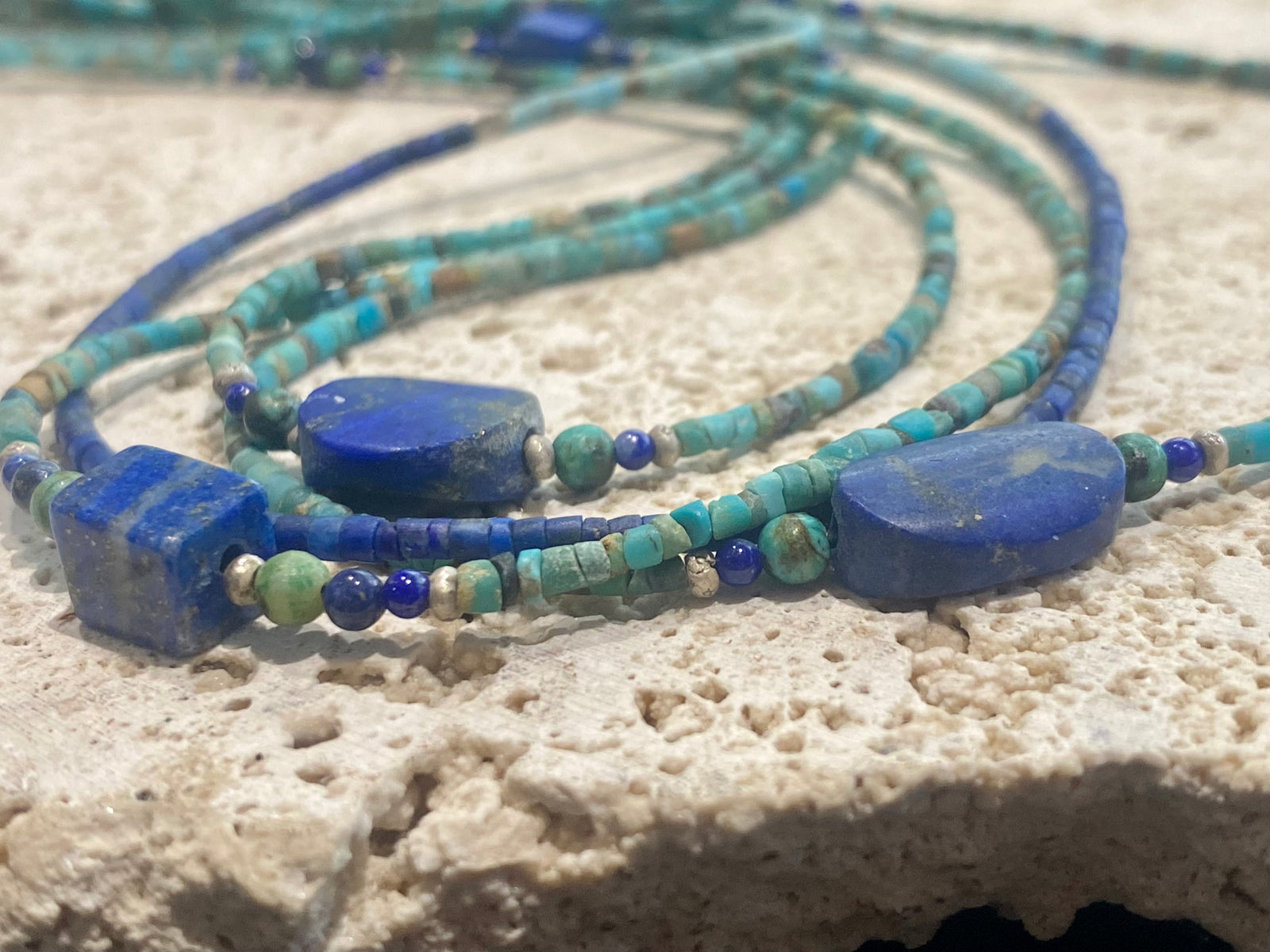 Fine beaded lapis and turquoise necklaces made from tiny tubes of turquoise, highlighted with lapis, African jasper and sterling silver. Our unisex necklaces are perfect for either men or women.