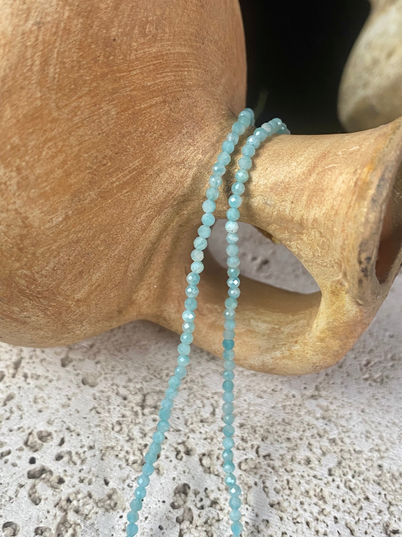 Natural clear blue amazonite facet cut fine bead choker. Brass screw clasp. Length 39.5 cm