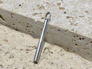 Elegant stick pendant in sterling silver with a generous bail to take even the largest of chains or cords. This is a unisex pendant and can easily be worn by both men and women  Measurements: length including bail 5 cm, width 3 mm