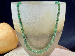 A classic necklace of graduated, matched natural emeralds featuring sterling silver findings and hook clasp. 70 carats of emeralds, length 45.5, bead size 2 mm - 6 mm