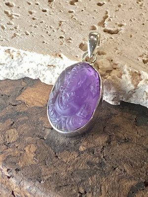 Hand carved amethyst ganesh pendant in a sterling silver mount. Height 3.3 cm