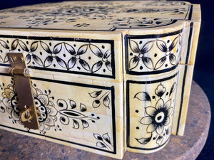 A beautiful rectangular hinged and lidded box crafted from hand shaped panels of camel bone over wood, which is then exquisitely hand painted. Hand made in Rajasthan, India. Measurements: width 25.5 x depth 20.5 cm, height 10.5 cm.