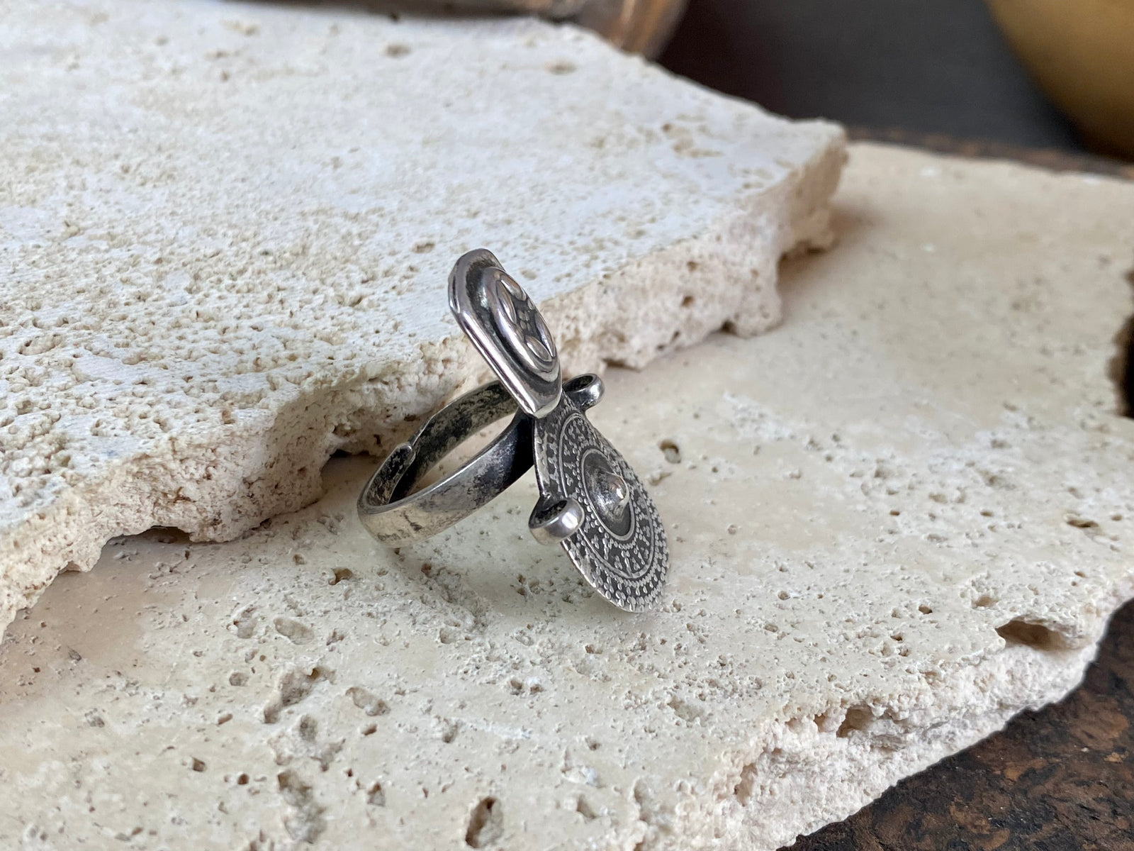 Statement tribal silver ring from regional Rajasthan, India. High grade or sterling silver. Adjustable back so it will fit a number of different finger sizes. Measurements: Ring face: 3.4 x 2.6 cm Size: Anywhere from size 6 to size 8, this ring is adjustable