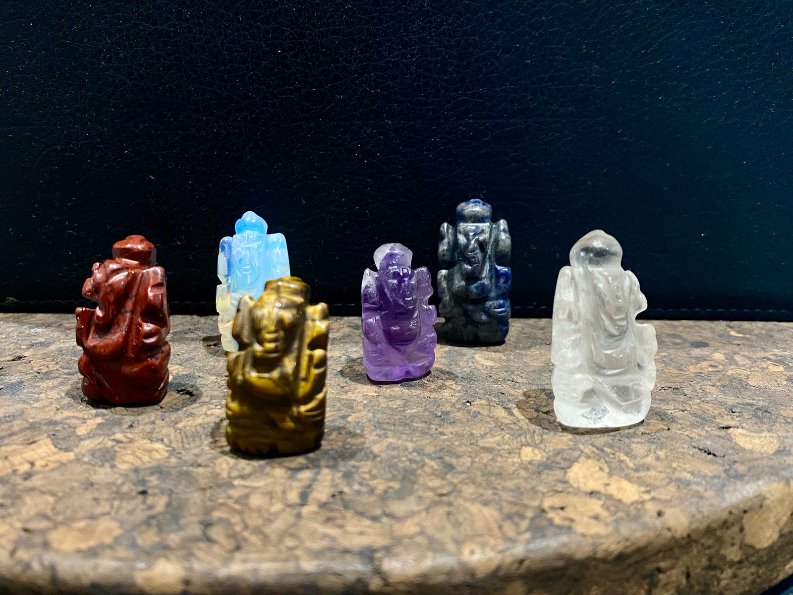 Hand carved from luminous gemstone, these are the perfect small Ganesh statue for travelling, if you're short on space or like to keep Ganesh with you at all times. Select the one you like best from the drop down menu. Range in size from 2.5 - 3 cm