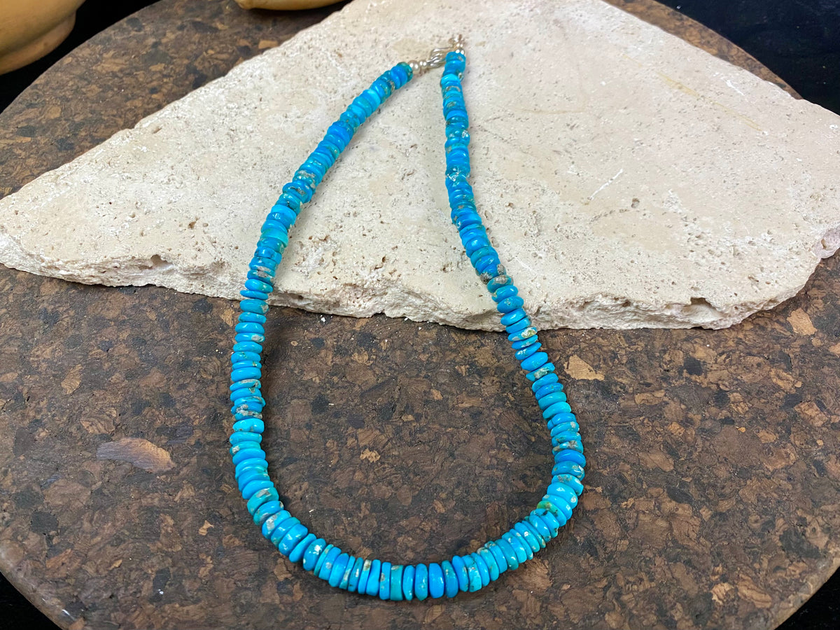 Heshi cut deep blue Arizona turquoise finished with sterling silver. length 44 cm