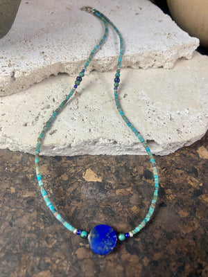 Fine beaded lapis and turquoise necklaces made from tiny tubes of turquoise, highlighted with lapis, African jasper and sterling silver. Our unisex necklaces are perfect for either men or women.