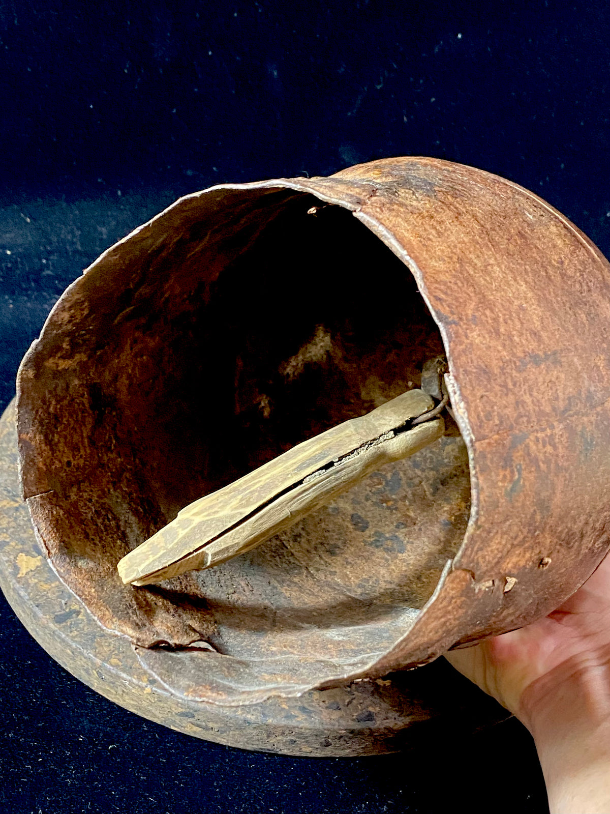 Antique camel or elephant bell, very large, one of the largest we've ever seen. This genuine old piece dates to the early 20th century and has a deep, melodic tone when rung. From Rajasthan, north India. Iron Measurements: Diameter at widest point 16 cm, height including handle 22 cm