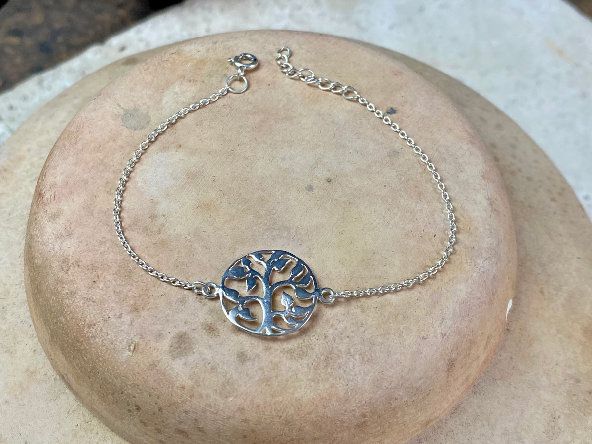 Elegant bracelets set with single stones in a sterling silver chain and clasp. Note that these bracelets are adjustable in length to suit your wrist size  Measurements: 17.2 - 19.8 cm length