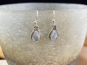  Elegant teardrop shaped earrings with a beautifully detailed bezel to show off the natural beauty of the cabochon stones. Sterling silver hooks complete the look. Our earrings are open-backed to allow natural light to show through. Length including hook 2.7 cm
